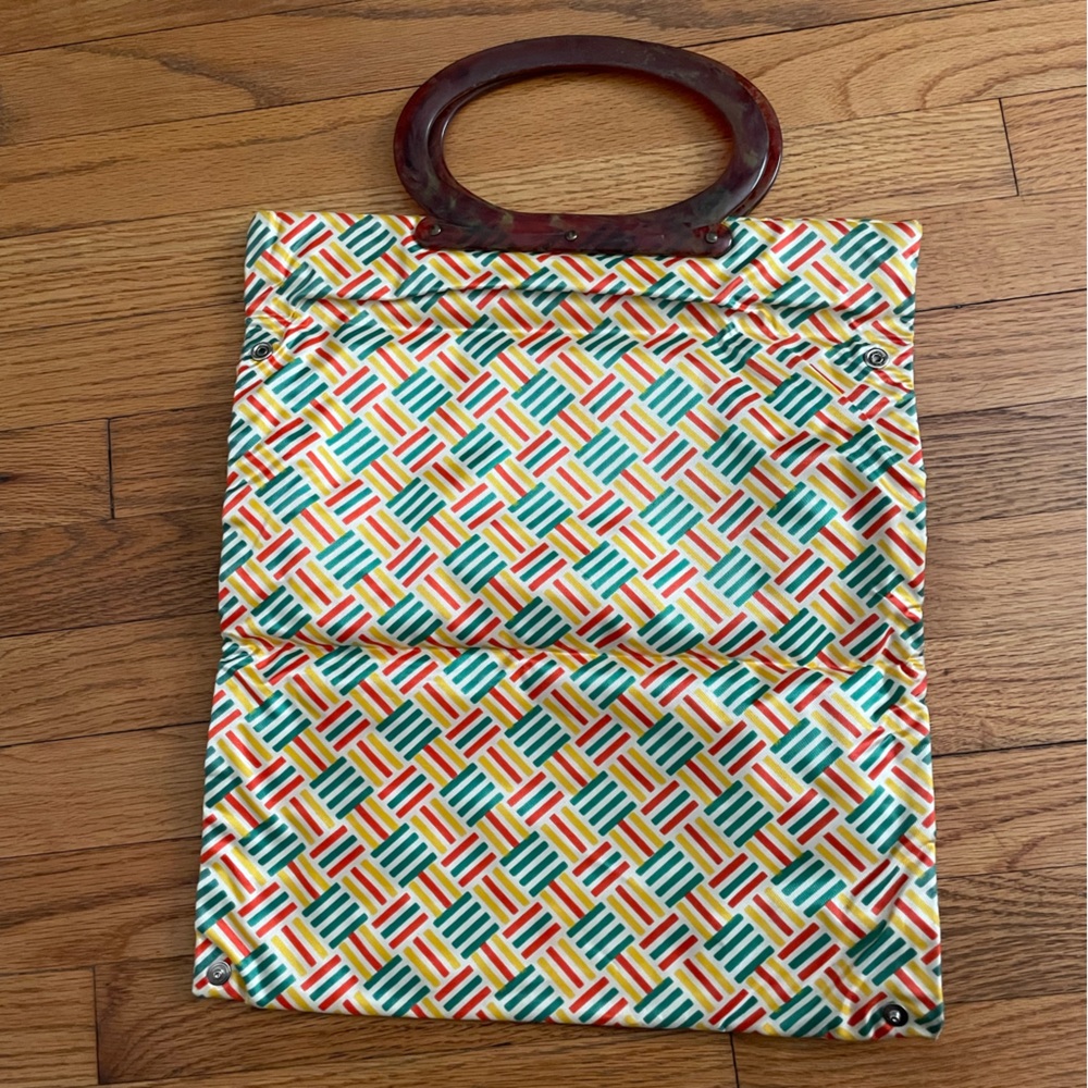 Vintage, expandable handbag with brown lucite handle